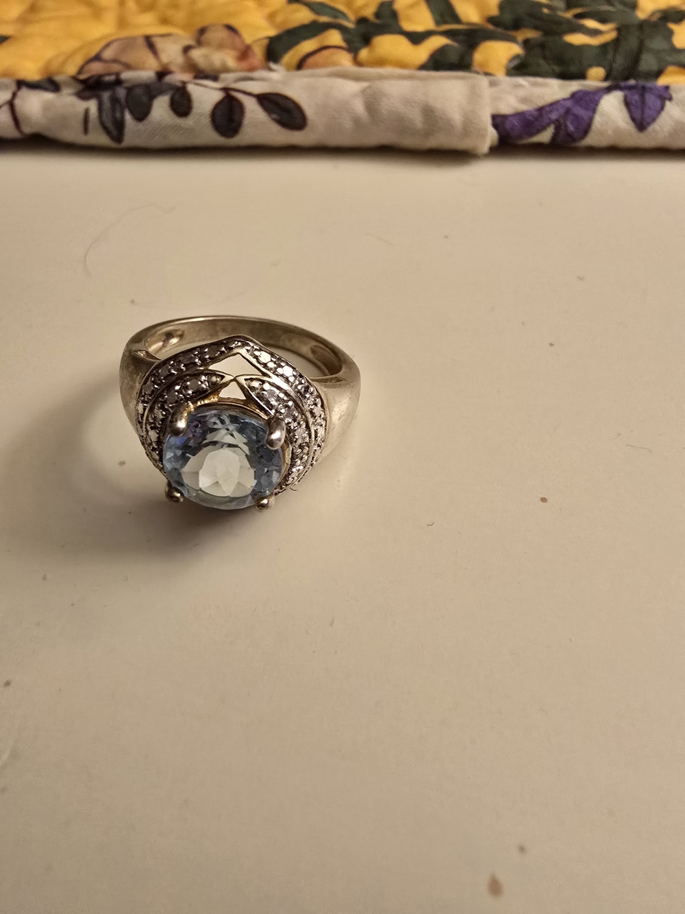 Silver Ring with Light Blue Gemstone and Accent Stones